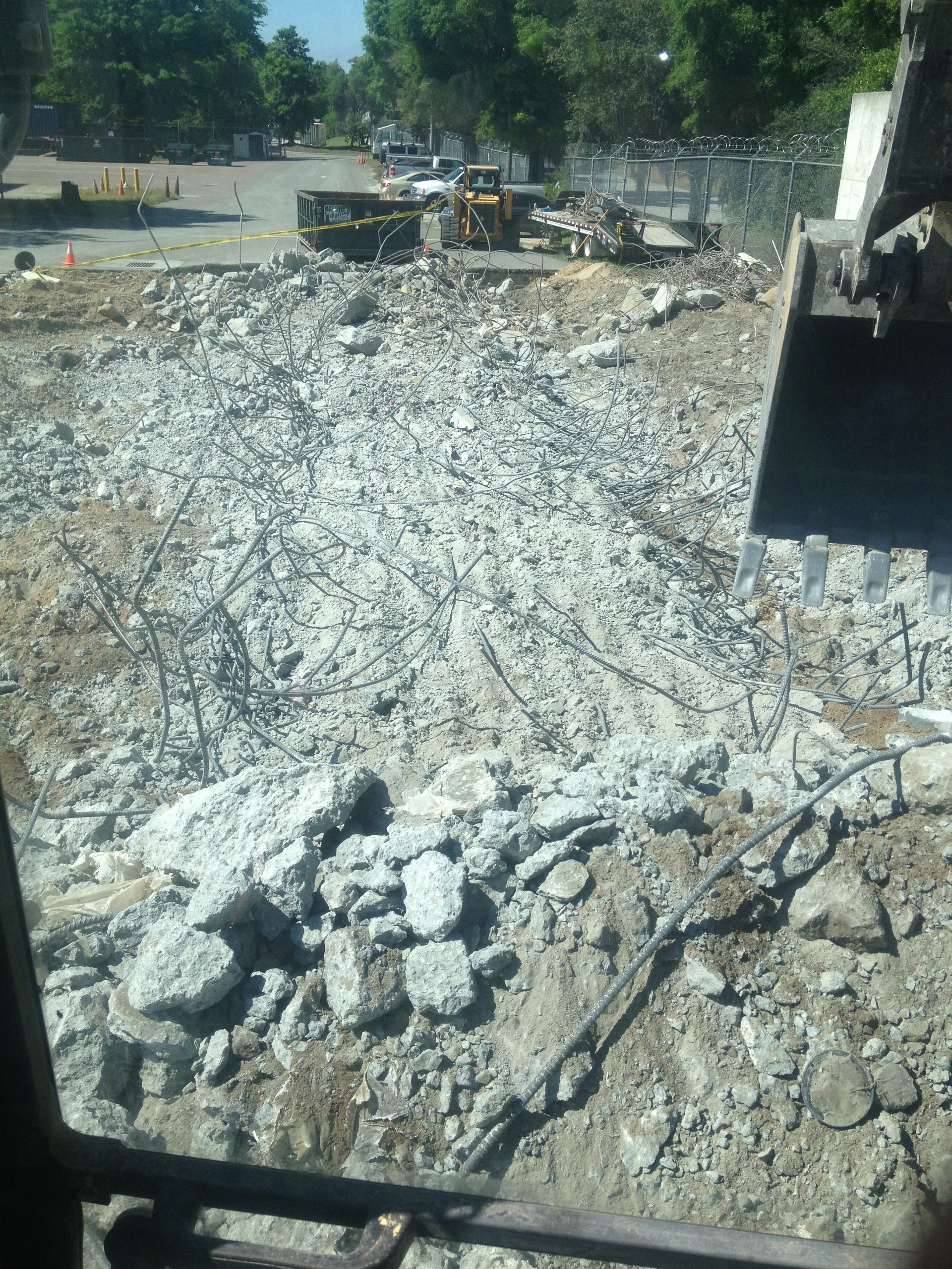 Loading broken concrete for haul off from a demolition site