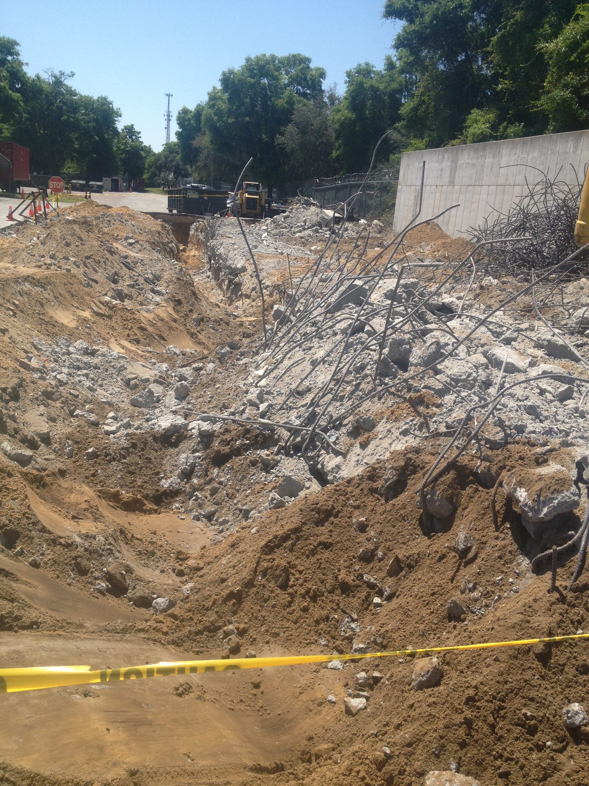 Excavator digging footings on a Middle Tennessee building site