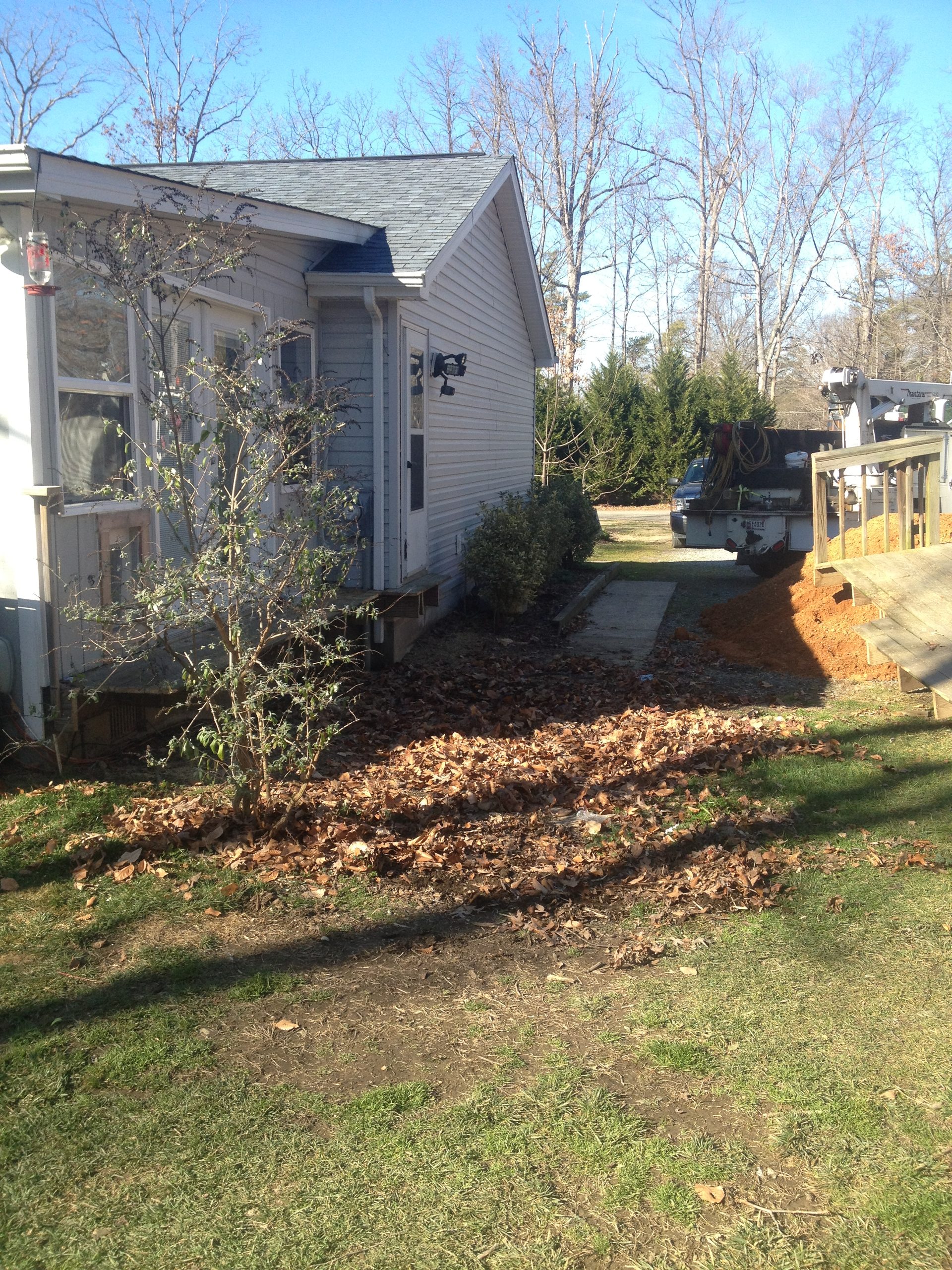Graded yard sloped away from the house for drainage